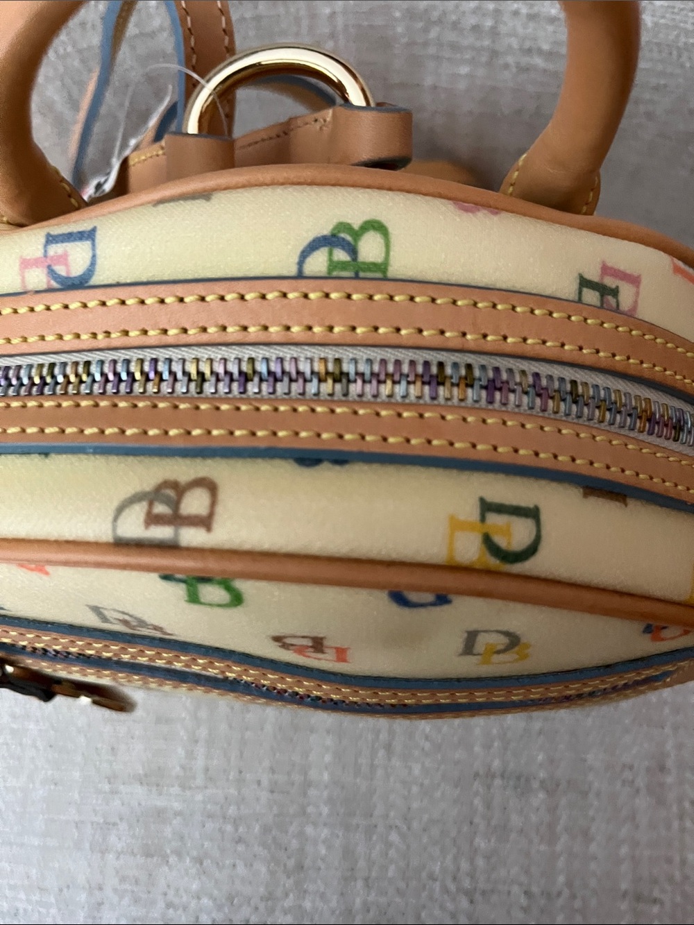 NWT Dooney & Bourke Cream Multicolor Logo Coated Canvas Backpack with Tan Trim - Picture 6 of 14